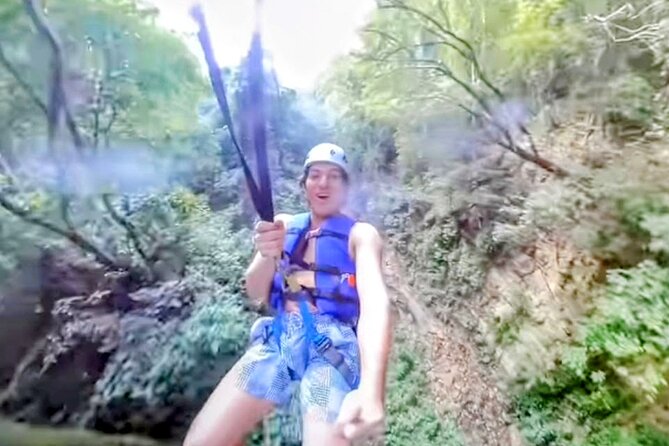 AMBER COVE-TAINO BAY 5 Zip Lines 7 Waterfalls + Locale Food - The zip line portion: canyon views plus real safety gear