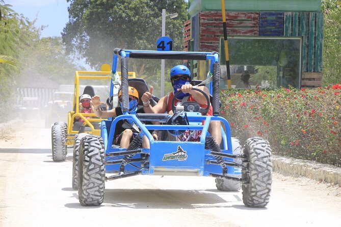 Buggy Ride, Cenote and Waterfall Pool at Bavaro Adventure Park - Cenote Blue Lagoon: a refreshing swim stop with a man-made feel
