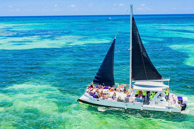 Catamaran Cruise with Snorkeling & Parasailing - Open Bar, Snacks, and Music on the Catamaran