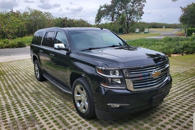 Deluxe SUV Private Round Trip Airport Transfer Uvero Alto Hotels 1-5 Passenger - Flight-Tracked Pickup: Less Stress When Plans Drift