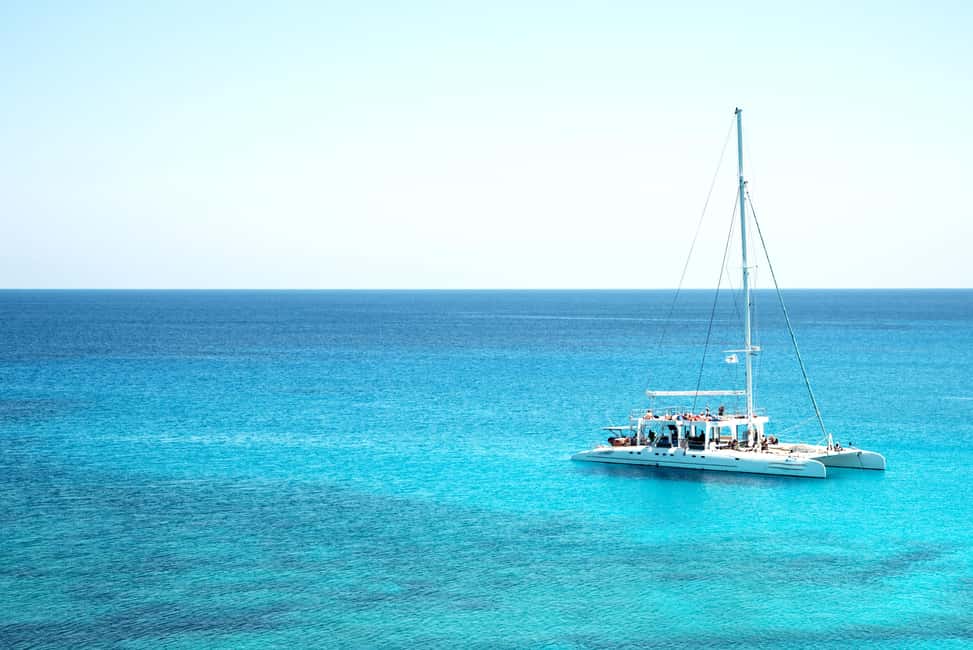 From Punta Cana: Catamaran Tour to Saona Island with Open Bar and Buffet - Lunch on Saona: Dominican BBQ, salad, and vegetarian choices