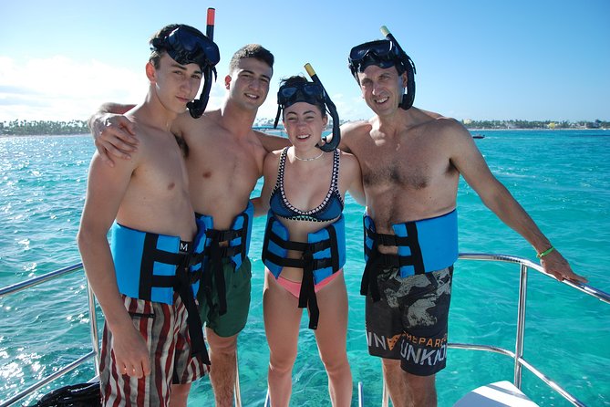 Great Snorkeling Cruise with Sharks & Stingray Encounter and Natural Pool - Party on the water: open bar, snacks, music, and that floating-bar vibe
