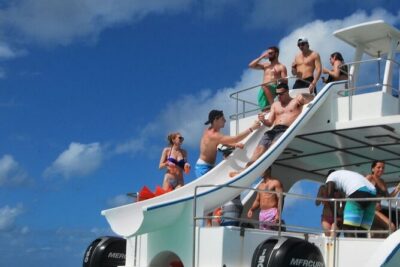 Party Boat /View Dolphins / Snorkling /Free Drinks and Transportation - Dolphin Viewing Parade: Seeing Them From the Water