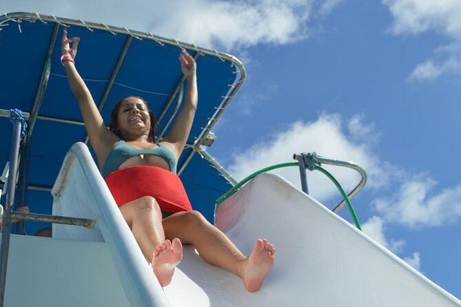 Private Party Boat with Slide and chicken skewers at Punta Cana - Bavaro Beach Cruise Back: Views, Dances, and a Built-In Party Finish
