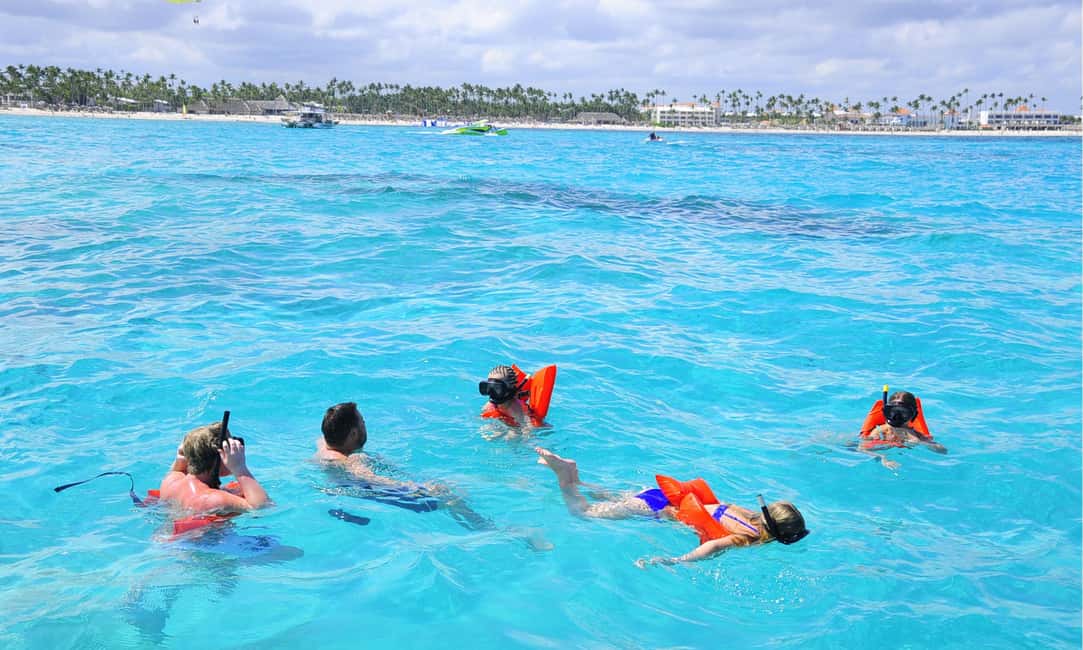 Punta Cana: Catamaran Tour with Reef Snorkeling and Open Bar - Life Aboard the Catamaran: Open Bar, Snacks, and Family-Friendly Energy