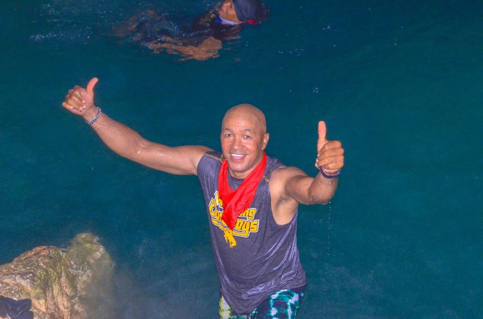 Punta Cana: Countryside and Macao Beach Half-Day Buggy Tour - Macao Beach time: waves, sand, and limestone cliff views