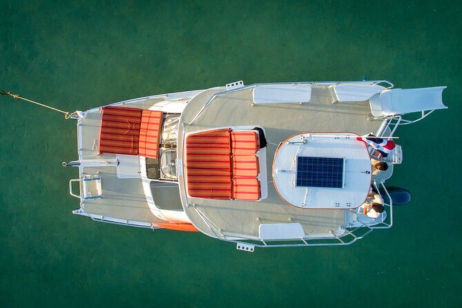 Punta Cana Private Catamaran Cruise with Drinks and Light Snacks - Stop 3: Natural Pool with shallow calm water, floating bar, and paddleboards (about 1 hour)