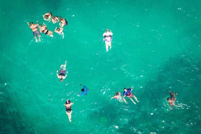 Small-Group Cruising and Snorkeling Catamaran Tour - Inside the Catamaran: Hammocks, Restrooms, and the Drink Flow