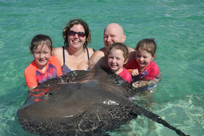 Small Group Snorkeling, Sharks & Stingrays Encounter by boat - On-board vibes: guides, music, and the stuff you can control